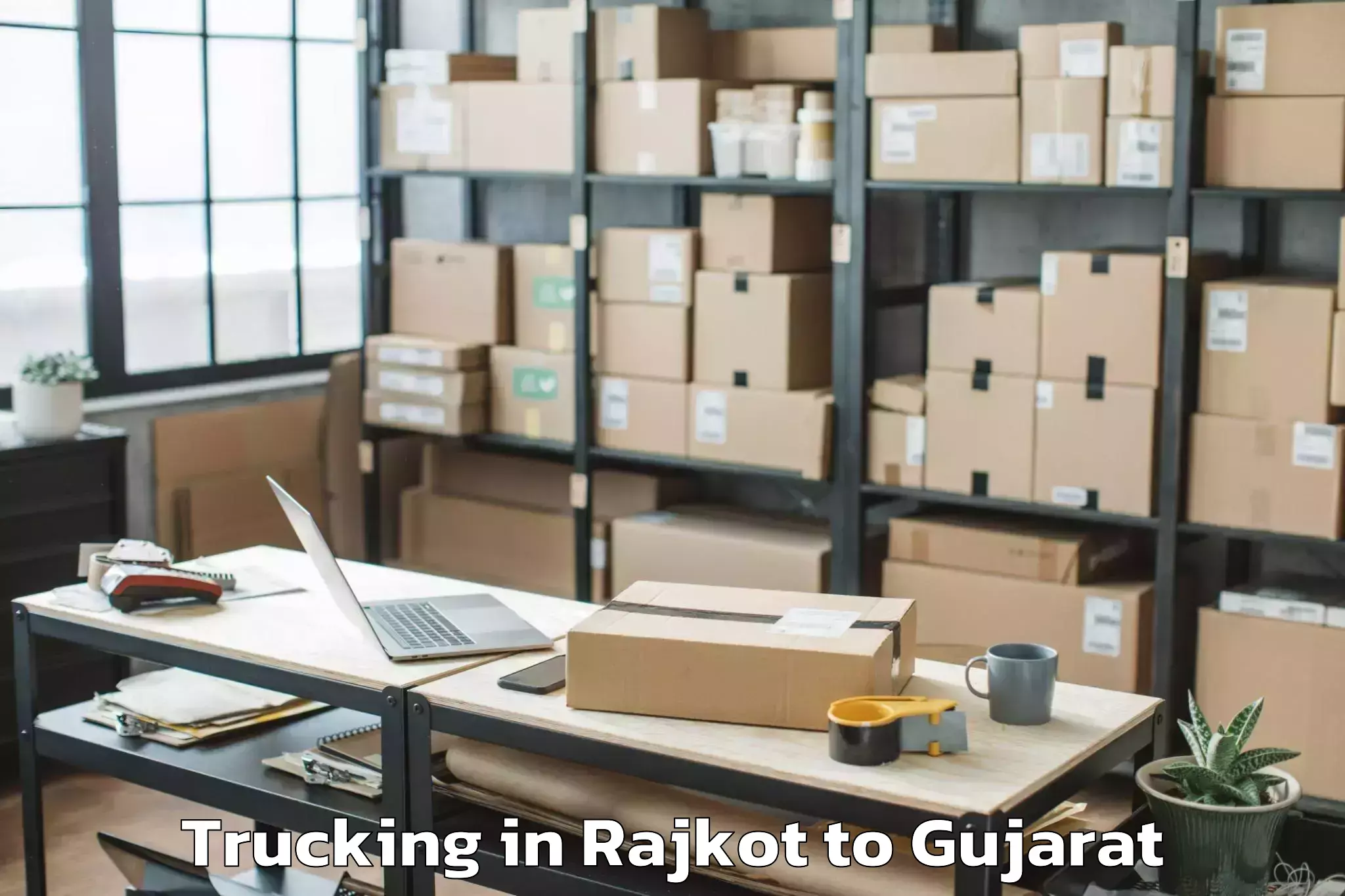 Top Rajkot to Koba Trucking Available